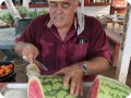 48 August 10   Mr. Gastellum prepares the first watermelon ever produced in a growboxx plant cocoon