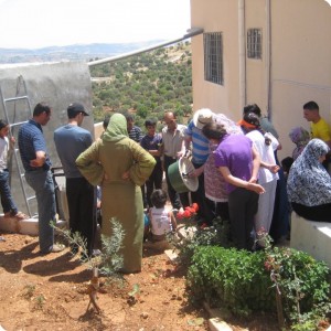 20120618   6 The community is getting together to listen to the plant instructions of our distributor Michael Schuring