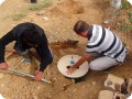 20161116   2 Eng. Nabeeh showing community member the steps of planting