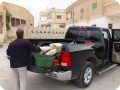 20161119   4 The truck is full with waterboxes and trees