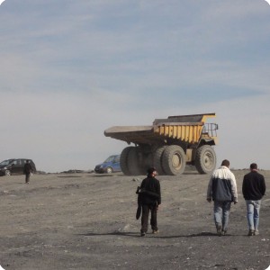 4 Enormous trucks transport the mine spill to mine dumps