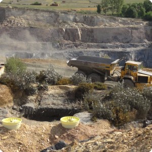 8 The giant trucks constantly transport mine spill to the dumps