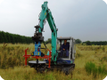 38. With the Groasis Capillary drill hanging in a crane  you can make planting holes aside of roads  on viaducts  or other difficult to reach places