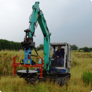 38. With the Groasis Capillary drill hanging in a crane  you can make planting holes aside of roads  on viaducts  or other difficult to reach places