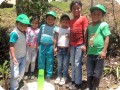 14. Teaching children how to plant trees  so they will have a nutricious and sustainable future